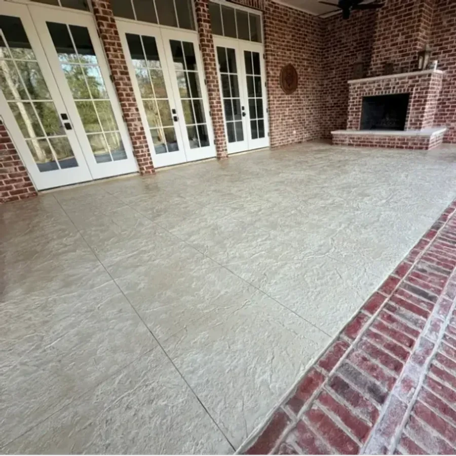 brushed concrete driveway with exposed aggregate border, Conroe, Texas